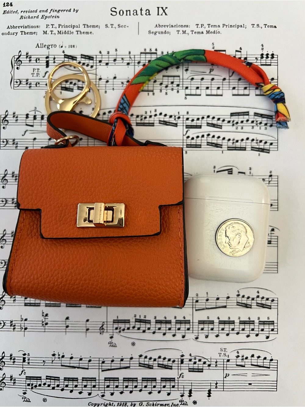 Mini Orange Leather Keychain Bag with Gold Hardware